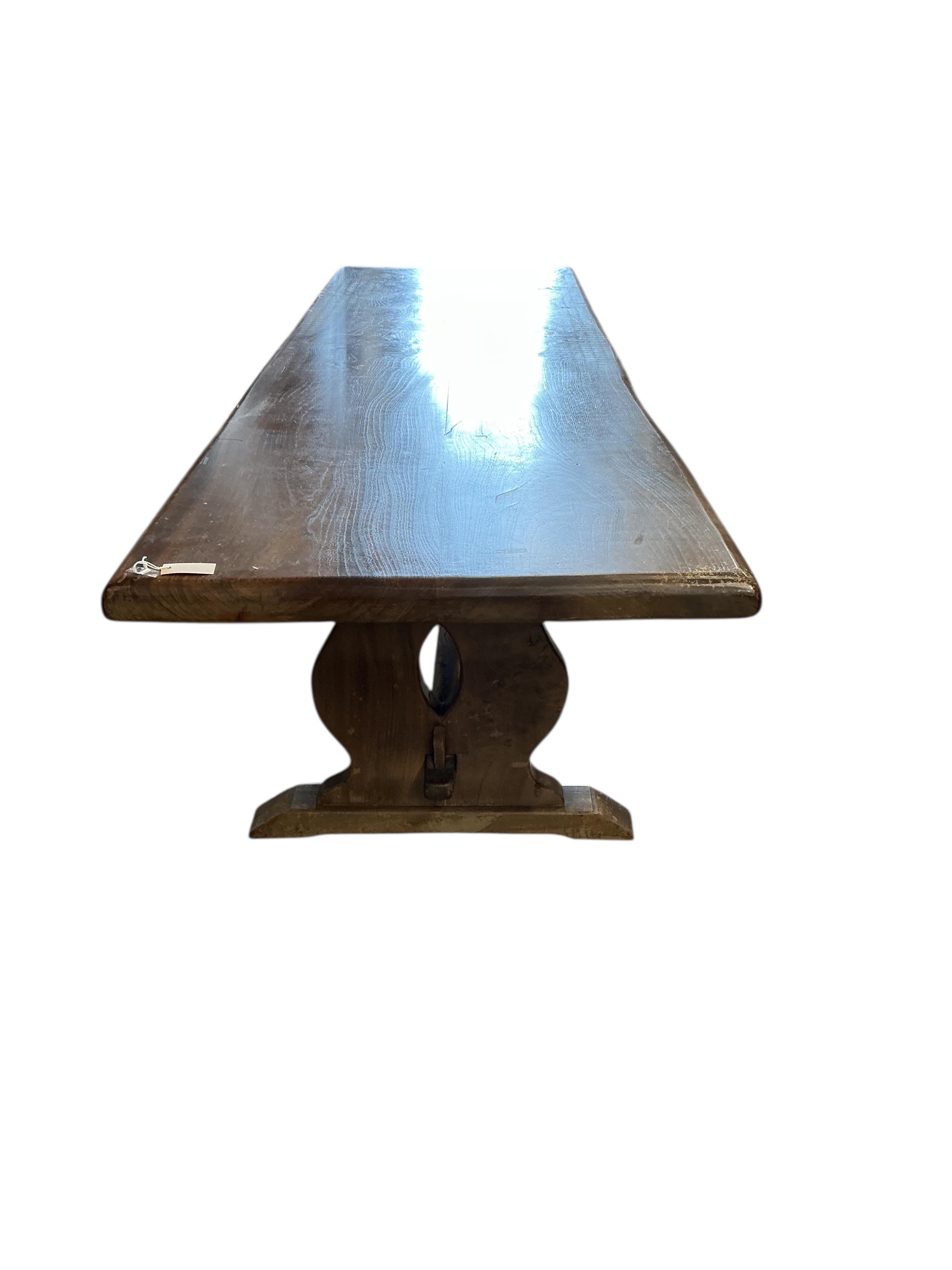 A 18th century style rectangular oak refectory dining table, width 294cm, depth 89cm, height 77cm
